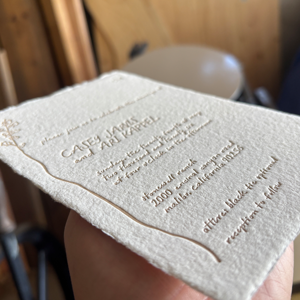letterpressed wedding invitation on handmade paper